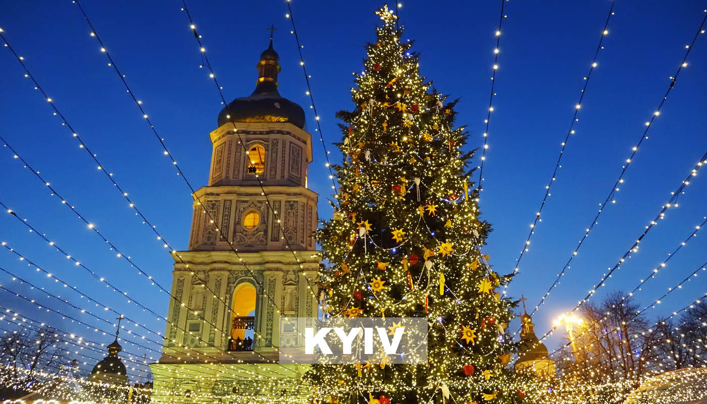 Photo of the St. Sophia Cathedral and luminous christmas tree in Kiev by night